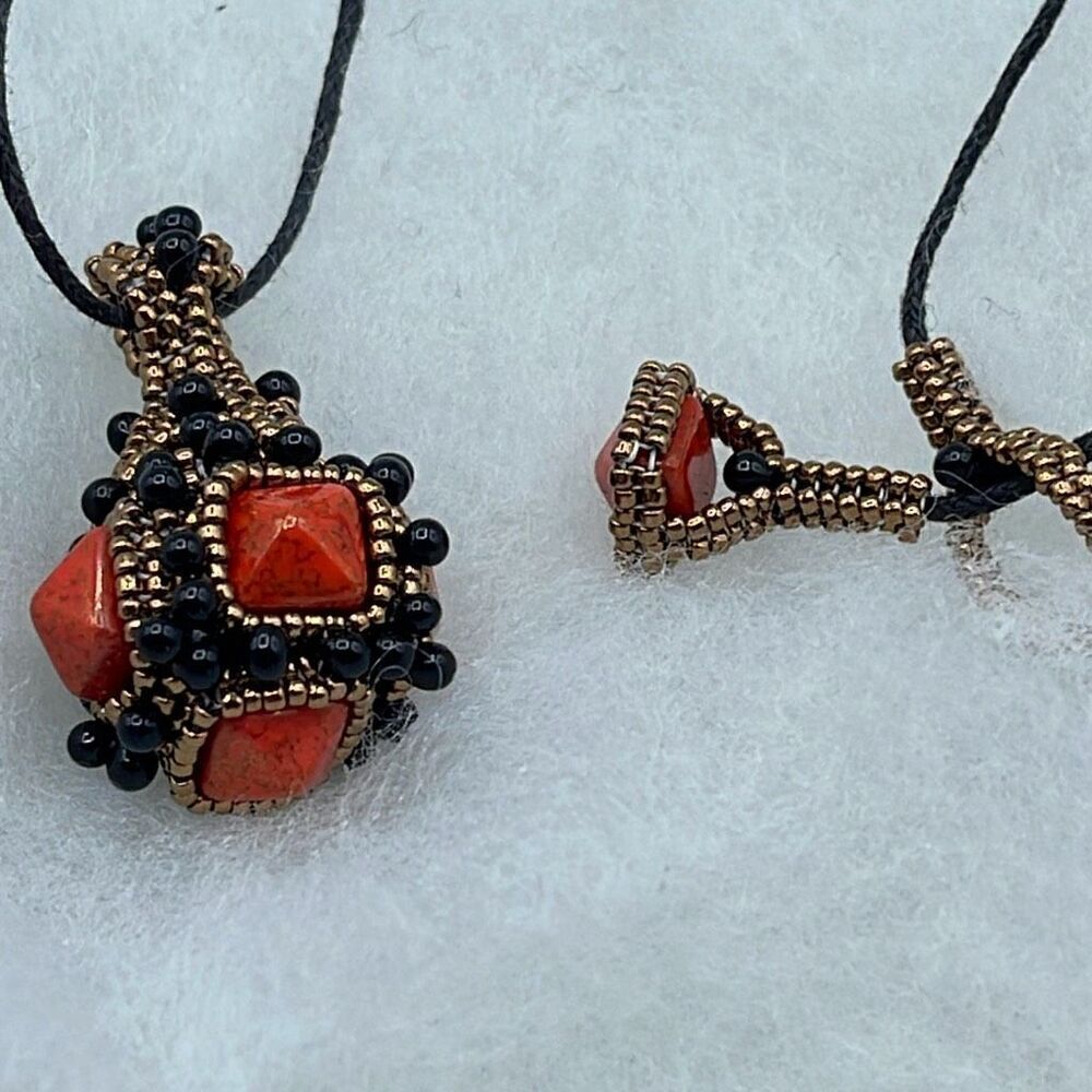 Artisan made beaded pendant clasp ornate unique.